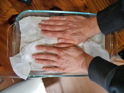no-bake granola pressing down